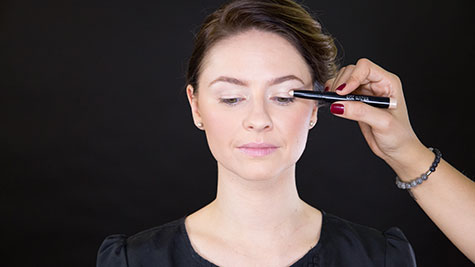 Apply a long-lasting champagne cream eyeshadow