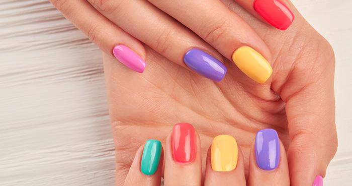 Mismatched multi-coloured nails